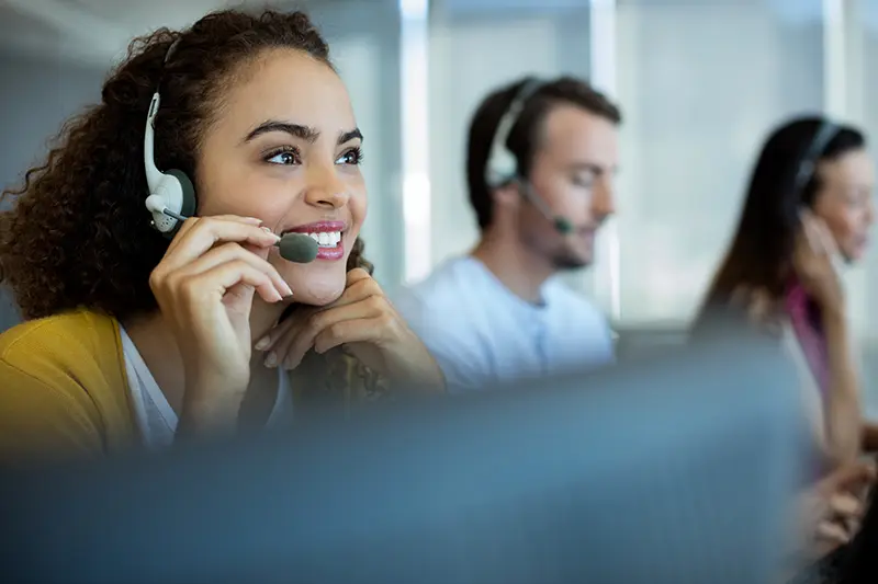 Multi-ethnic customer service executive on the phone