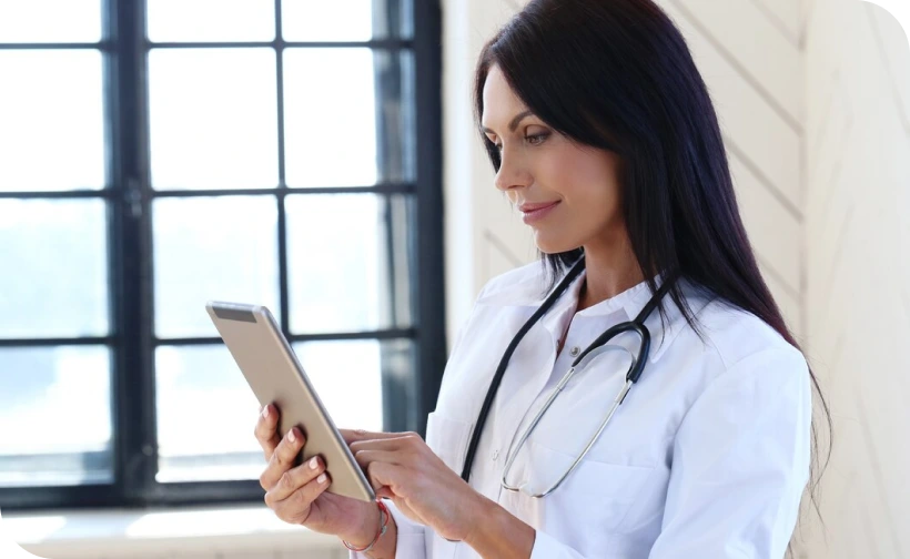 health professional viewing patient data on tablet health professional viewing patient data on tablet